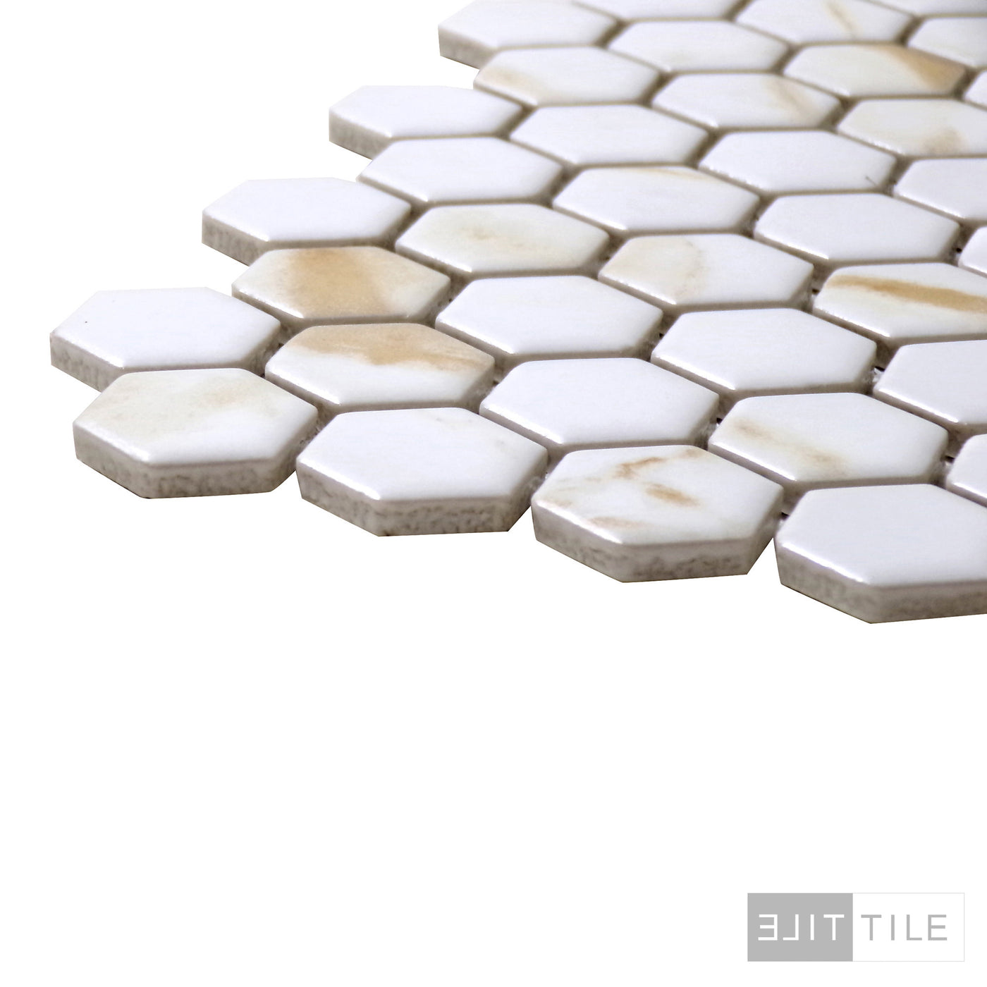 PORCELAIN GLAZED HEX MATTE 1X1 1X1 CALACATTA GOLD MATTE PRIMARY CORNER SHOT