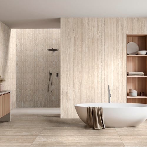 Minimal, soft-toned restroom scene featuring Travertine Veincut  24X48 Bianco Matte tile on both the wall and floor.
