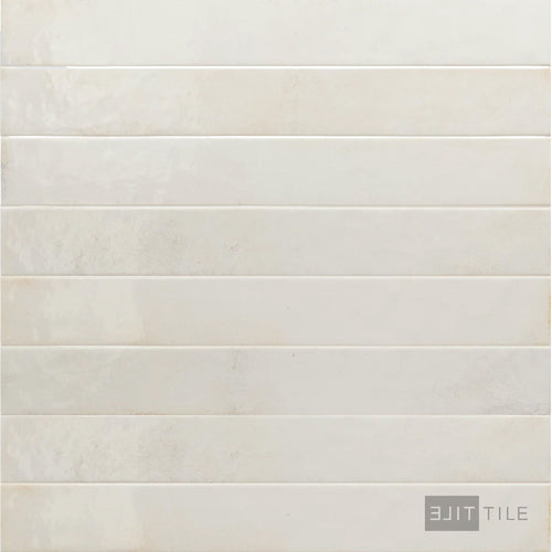Product overview of Bali White 2x16 glossy ceramic tile featuring a slim format, bright white tone, and reflective finish