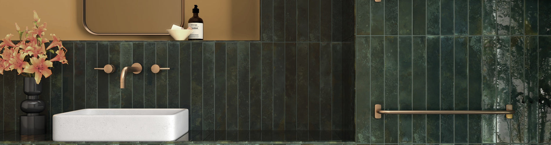 Bali Isle Of Pines 2x16 glossy ceramic tile installed on a bathroom wall with deep green variation