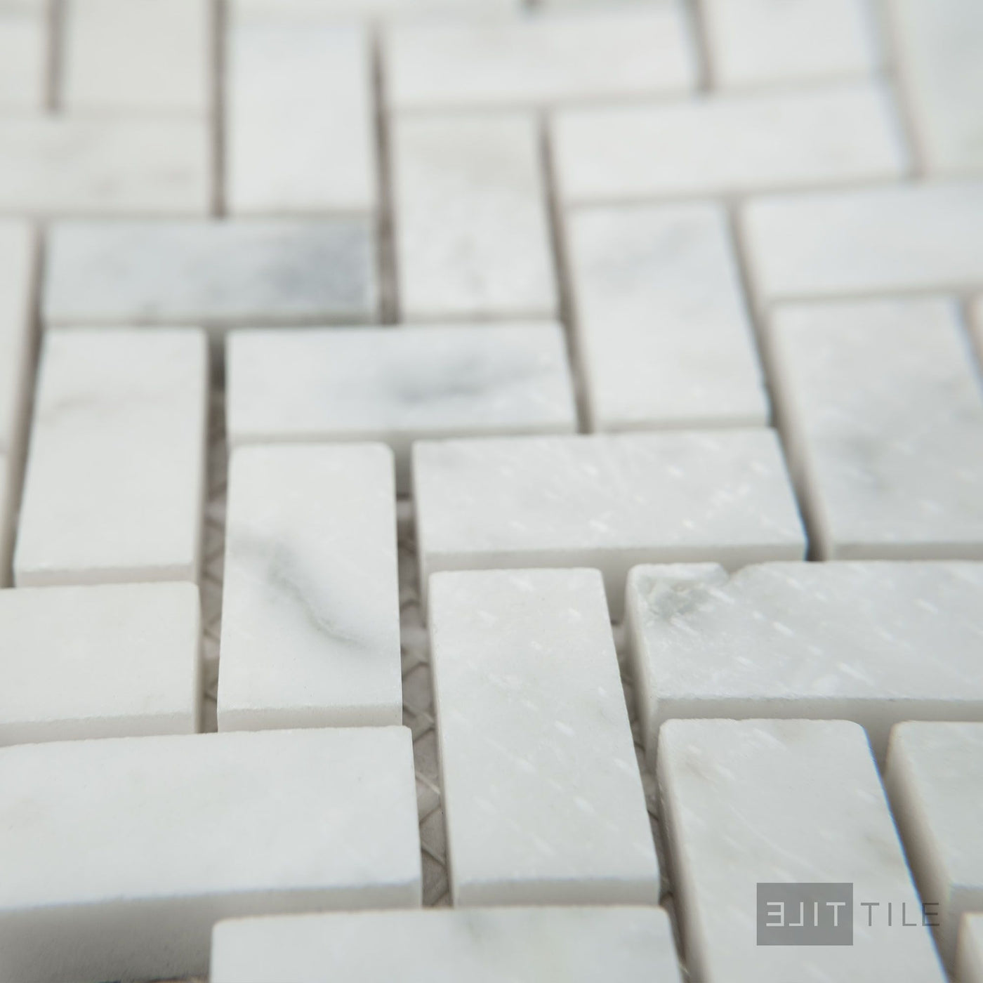 White Carrara Marble 5/8X1-1/4 Herringbone Honed Mosaic