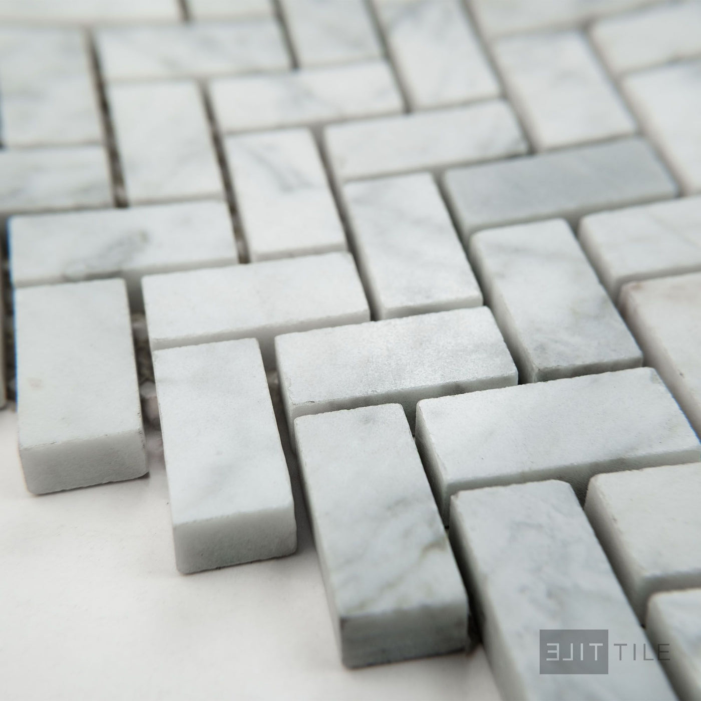 White Carrara Marble 5/8X1-1/4 Herringbone Polished Mosaic
