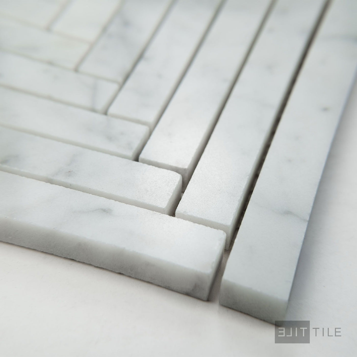White Carrara Marble 5/8X6 Herringbone Polished Mosaic