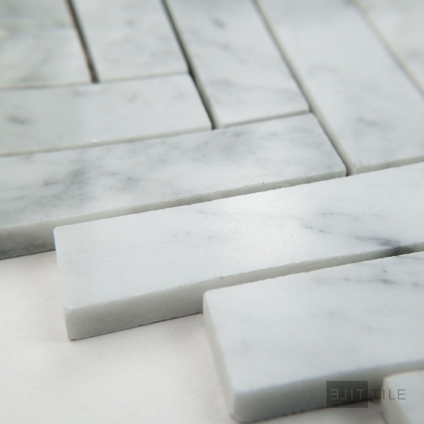 White Carrara Marble 1X4 Herringbone Polished Mosaic