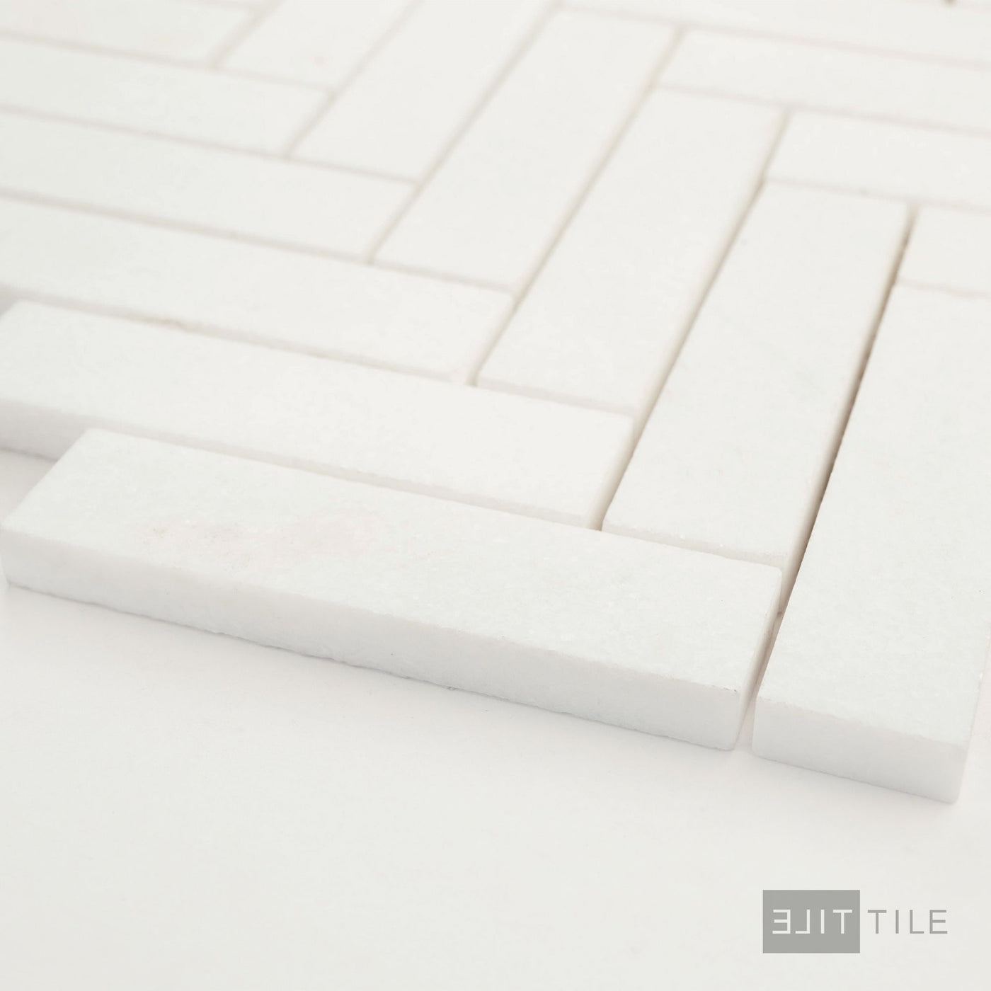 Thassos White Marble 1X4 Herringbone Honed Mosaic