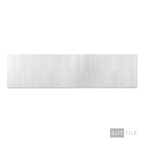 Close-up of Slant 3D Bone 16x48 matte ceramic tile showing raised texture and a soft neutral surface