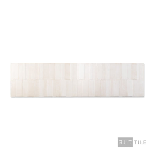 Direct overhead shot of Slant 3D Sand 16x48 matte ceramic tile with warm beige tone and sculpted detail