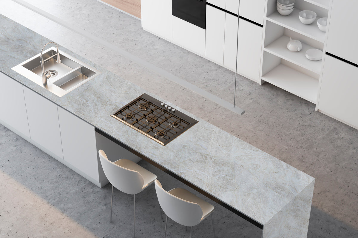 ElitTile light gray marble countertop on modern kitchen island with integrated sink and cooktop from premium countertops collection