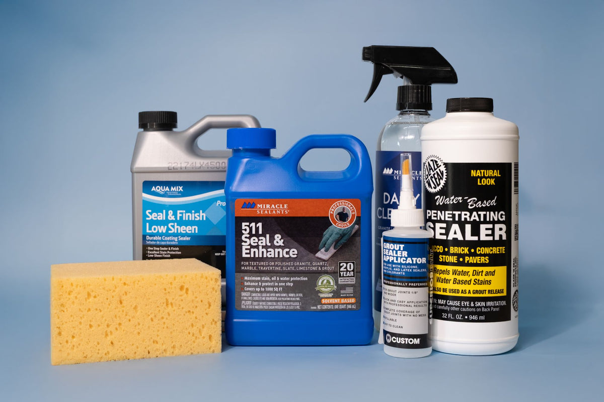 Assortment of tile and grout sealers and cleaners, including Aqua Mix, Miracle Sealants, and Glaze 'N Seal products with applicator