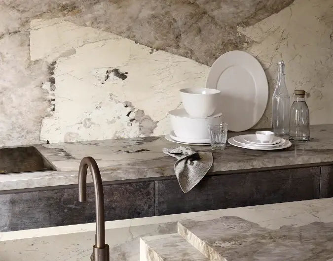 Modern kitchen with ElitTile porcelain slabs - pristine white surfaces with subtle veining on countertops and backsplash from premium countertops collection